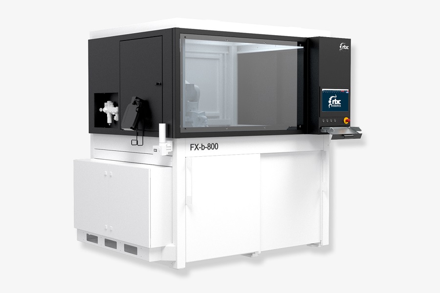 rbc robotics FX Pack 800 Automatisierungszelle mit Schutzumhausung und integriertem Bedienpanel.